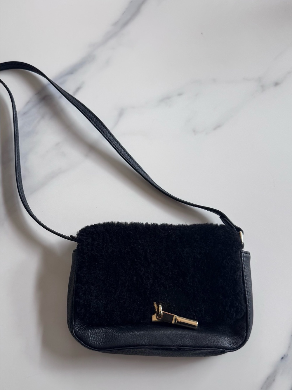 Elizabeth and James black shearling crossbody bag
